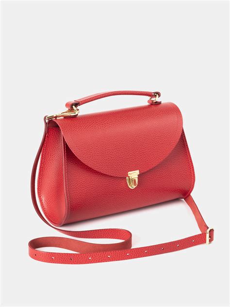 designer crossbody bags under 300.